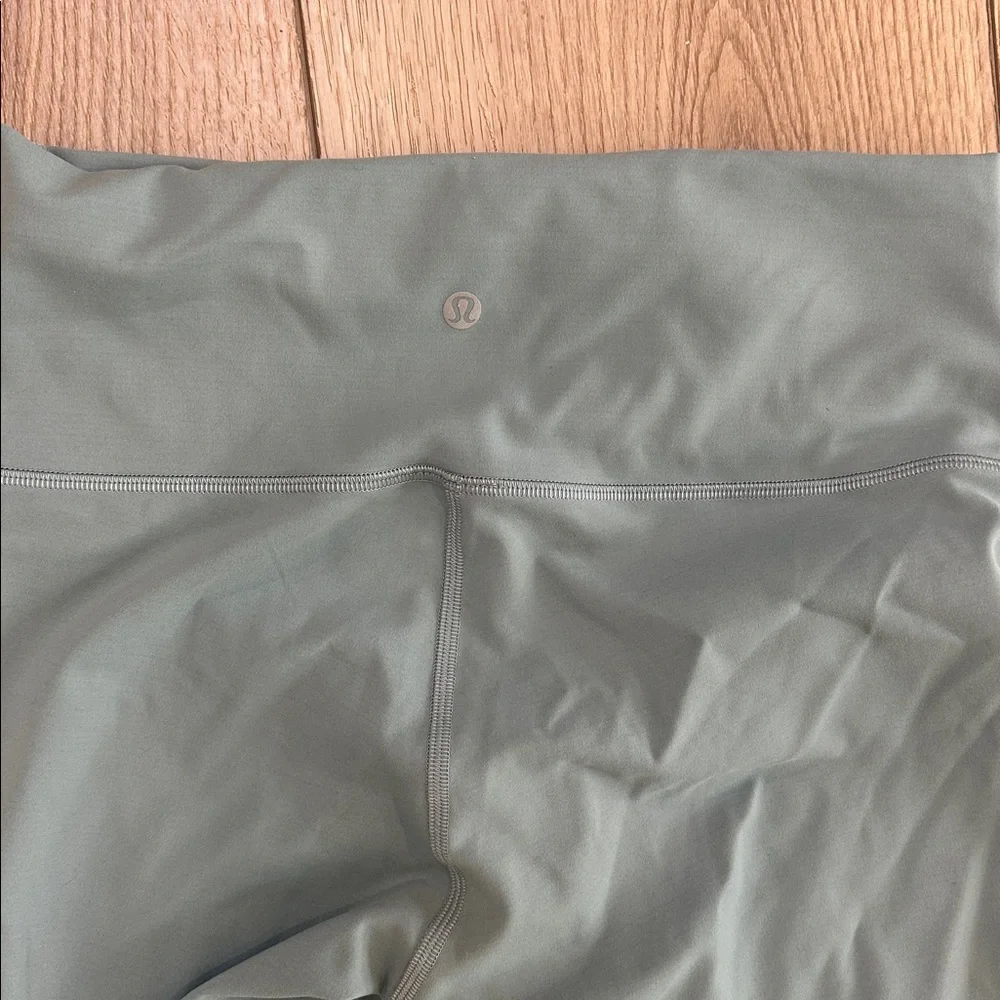 #507 LULULEMON ATHLETICA Wunder Train Cropped 21” Leggings in Dusty Teal